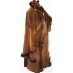COGNAC DYED SHEARED MINK WITH LONG HAIR TRIM